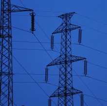 Juan’s Telecom transmission line services two pylons on a blue background